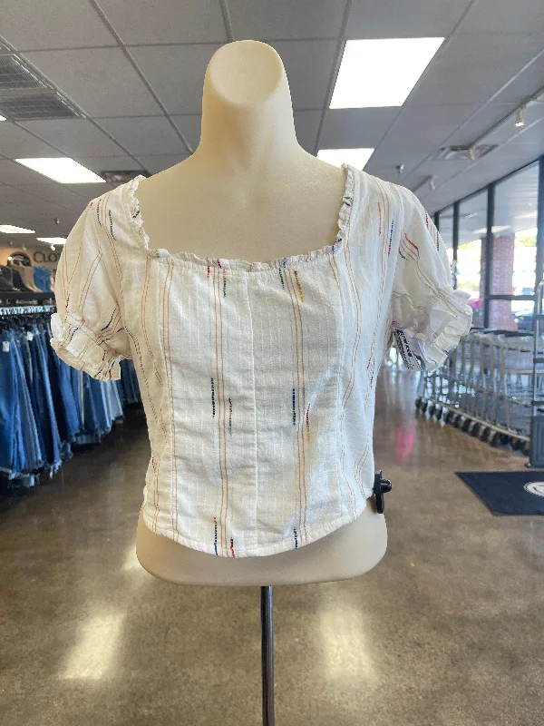 women's tops for those who want to create stylish and put-together outfits without spending a fortuneTop Short Sleeve By Free People In Cream, Size: S